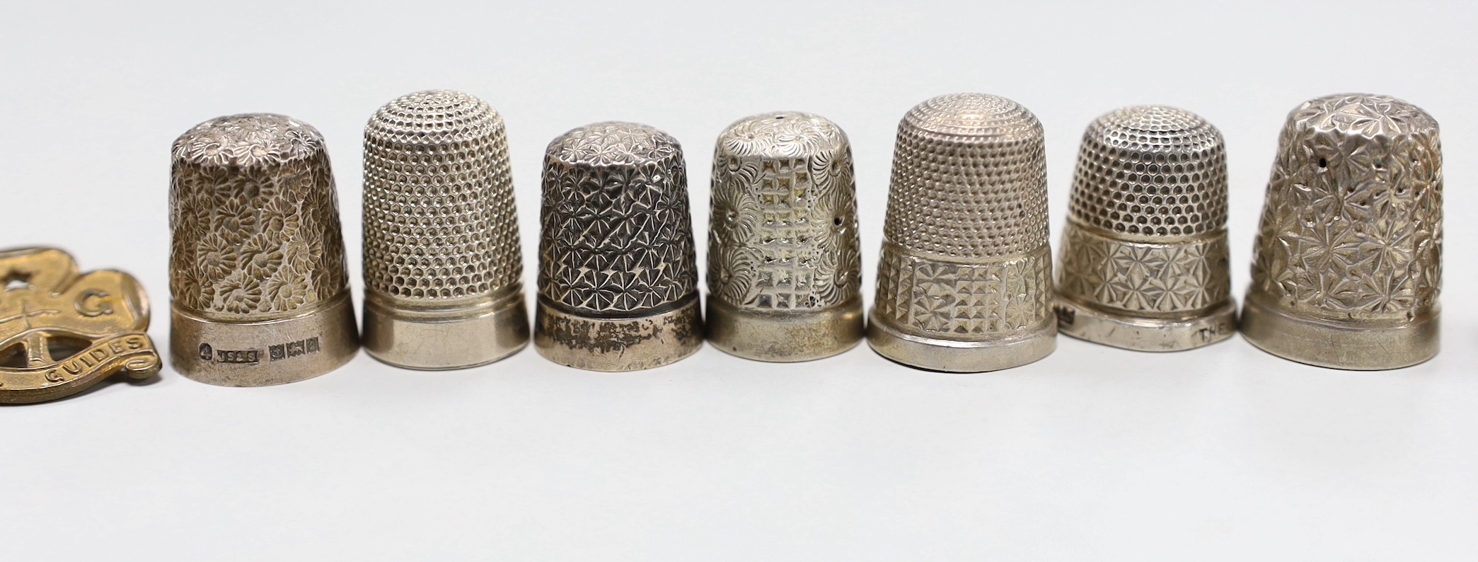 Eight assorted silver thimbles, including one in fitted leather case and two other items, etc.
